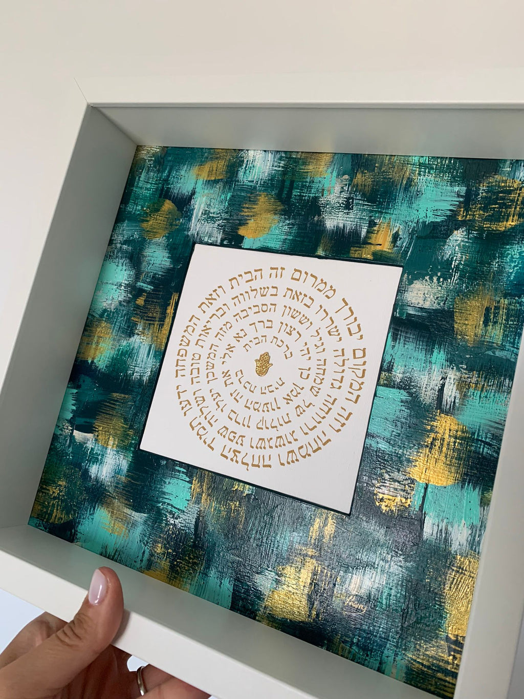 Birkat HaBayit shades of green artwork held in hand, framed home blessing with emerald and gold tones, Jewish housewarming gift